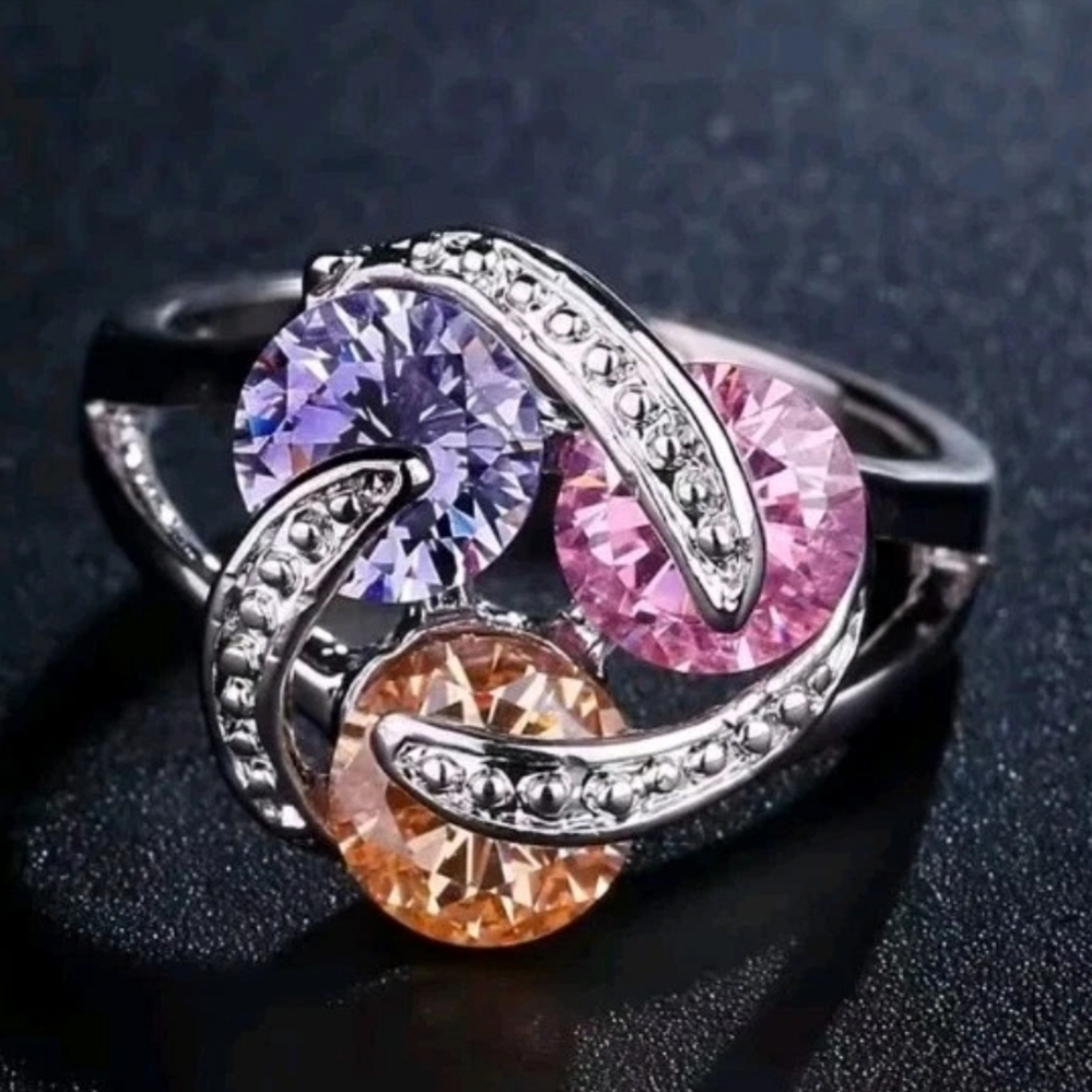 Sparkling Zirconia With Pink,yellow, and Purple Rotating Gemstone Design Sz 8